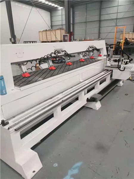 诚迈开槽侧孔机 全自动侧孔机在电视柜侧打孔与机械钣金中的应用